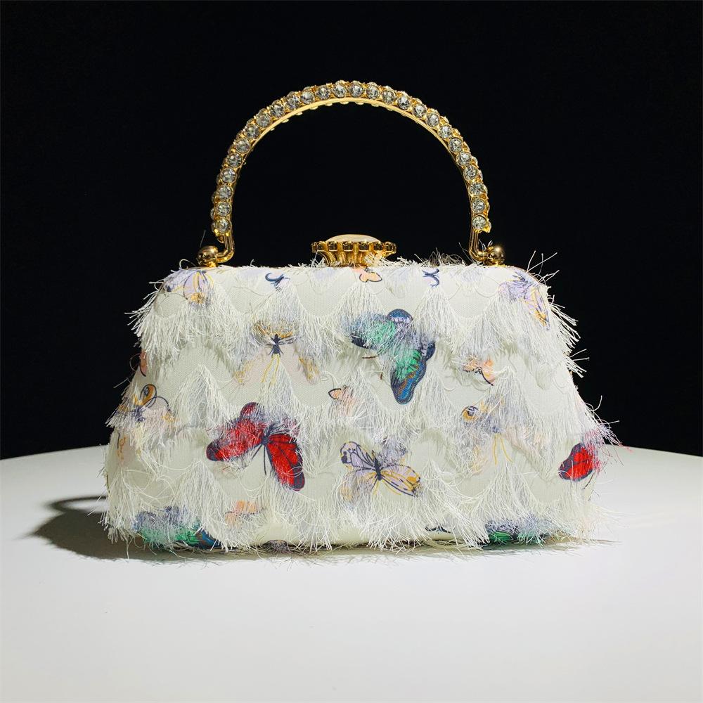 Evening Bags Clutches Tassel Butterfly Top-Handle Prom Clutch Long Chain Shoulder Handbags Wedding Bridal Female Purse Bags 21cmX12.5cmX5cm
Evening Bags Clutches Tassel Butterfly Top-Handle Prom Clutch Long Chain Shoulder Handbags Wedding Bridal Female Purse Bags 21cmX12.5cmX5cm