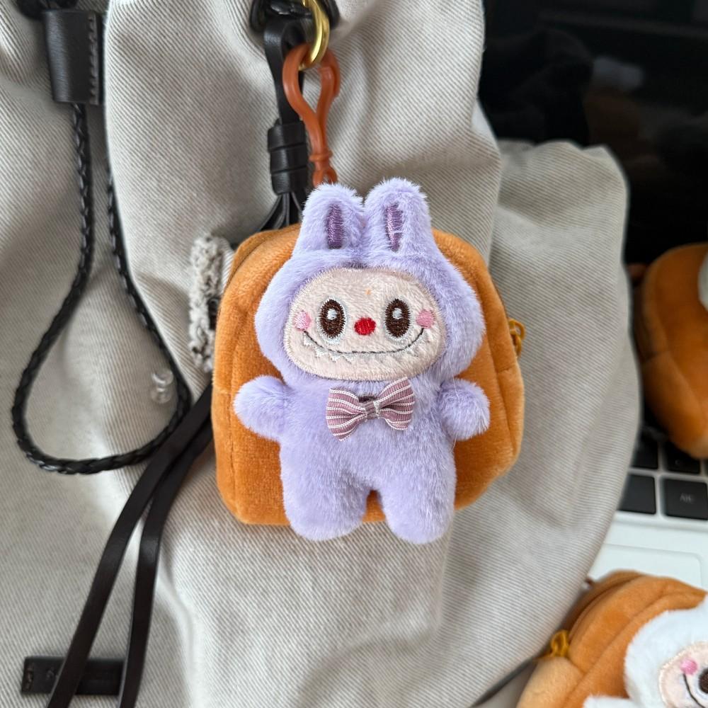 Милый плюшевый кулон-кошелек для монет в виде куклы Лабубу, брелок, маленькая подарочная монетница для девочек на день рождения фиолетовый
Милый плюшевый кулон-кошелек для монет в виде куклы Лабубу, брелок, маленькая подарочная монетница для девочек на день рождения фиолетовый