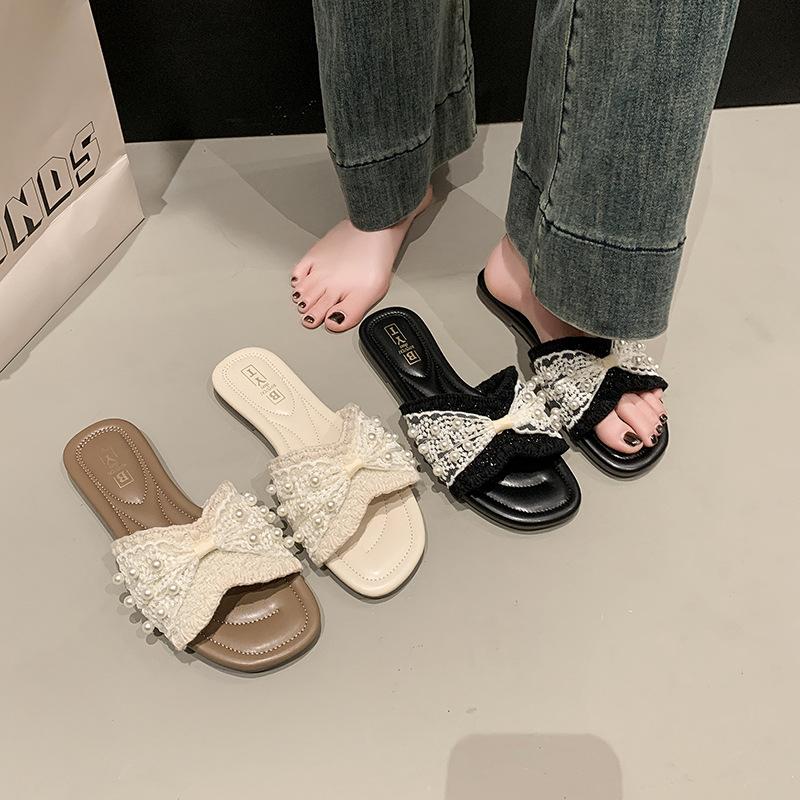 Pearl slippers women s summer wear 2025 new fashion flat bottom one word beach cool slippers 35 чорний
Pearl slippers women s summer wear 2025 new fashion flat bottom one word beach cool slippers 35 чорний