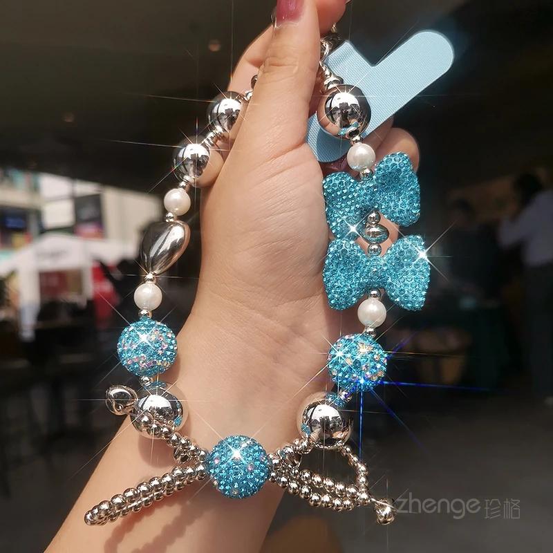 Phone Strap Dense Diamond Bow Beaded Bracelet Hanging Rope Flash Diamond Handheld Wrist Ornament Clip Style Phone Case
Phone Strap Dense Diamond Bow Beaded Bracelet Hanging Rope Flash Diamond Handheld Wrist Ornament Clip Style Phone Case