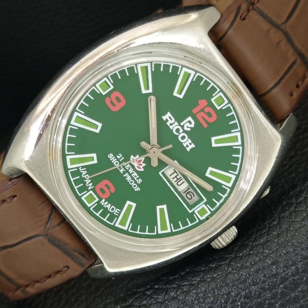 AUTOMATIC VINTAGE RICOH R31 JAPAN MENS GREEN COLOR DIAL WATCH a707721-1
AUTOMATIC VINTAGE RICOH R31 JAPAN MENS GREEN COLOR DIAL WATCH a707721-1