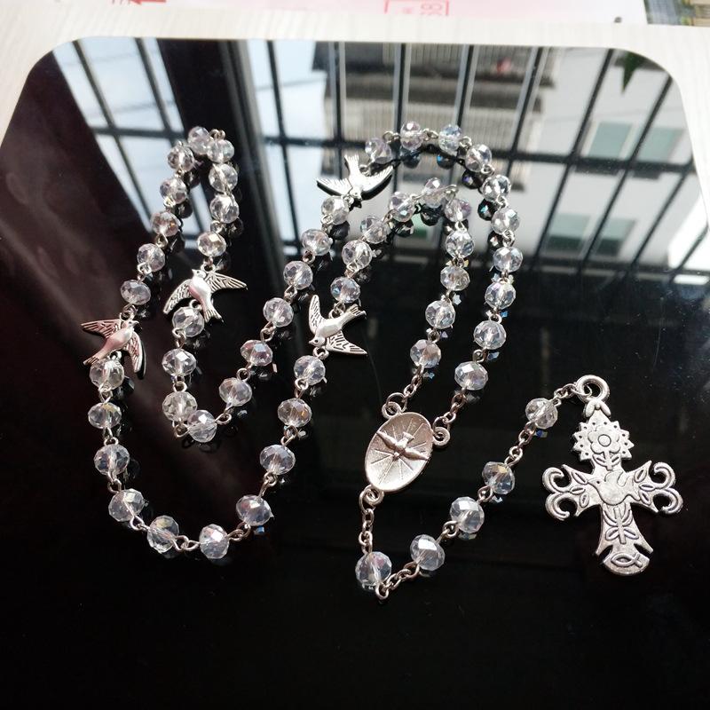 Ожерелье с крестом из белого стекла и 59 бусин, длинная подвеска Мария из сплава
Ожерелье с крестом из белого стекла и 59 бусин, длинная подвеска Мария из сплава