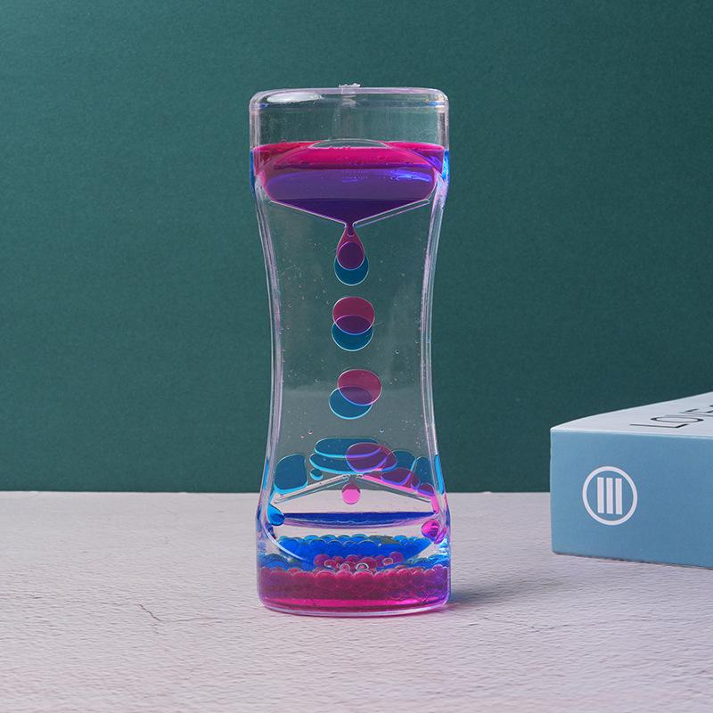 Hourglass Liquid Timers with Double Colors and Floating Motion Bubbles for Desk Decor 5.5*13.5 CM
Hourglass Liquid Timers with Double Colors and Floating Motion Bubbles for Desk Decor 5.5*13.5 CM