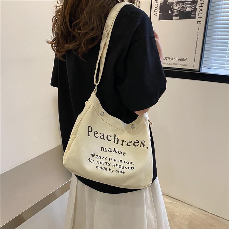 Large capacity leisure bag canvas bag 2025 this year popular campus make-up one shoulder messenger bag spring and summer fashion women коричневий
Large capacity leisure bag canvas bag 2025 this year popular campus make-up one shoulder messenger bag spring and summer fashion women коричневий