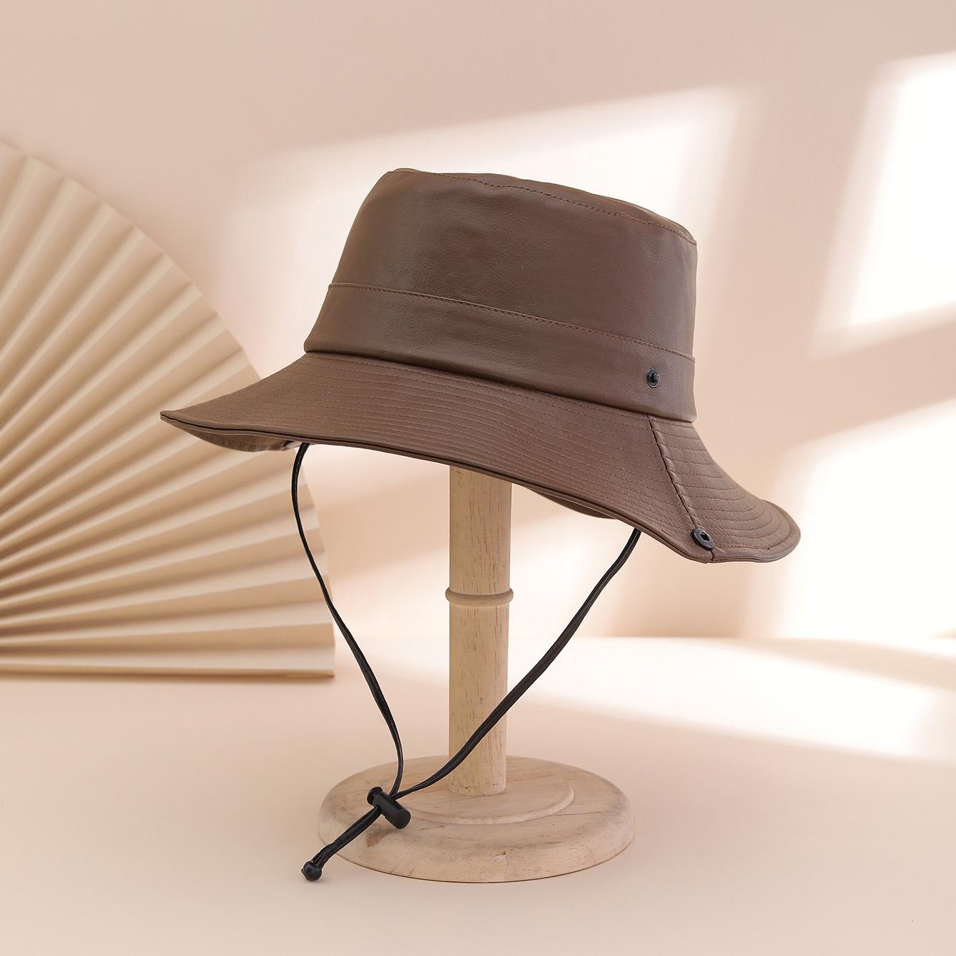 Simple and casual pure-color PU reversible hat with drawstring and rope. Waterproof sun hat suitable for outdoor outings. One Size
Simple and casual pure-color PU reversible hat with drawstring and rope. Waterproof sun hat suitable for outdoor outings. One Size