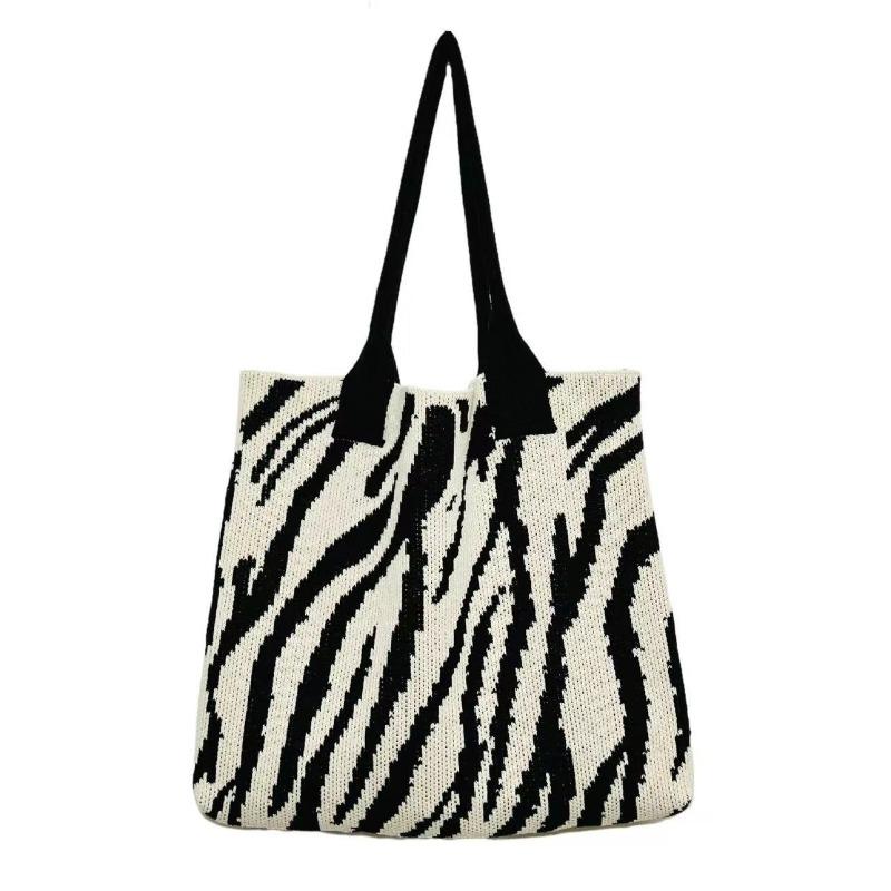 New women s woven bag zebra pattern fashion shopping bag beach bag knitted bag portable shoulder bag
New women s woven bag zebra pattern fashion shopping bag beach bag knitted bag portable shoulder bag