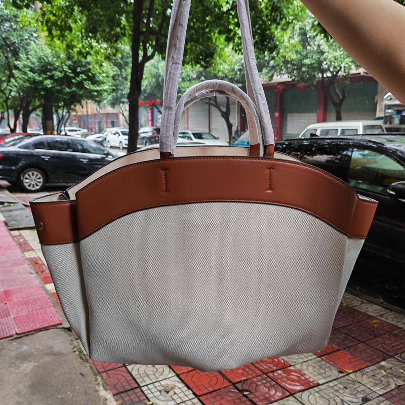 Новая модная сумка-тоут из парусиновой кожи, портативная пляжная сумка через плечо, повседневная сумка для покупок
Новая модная сумка-тоут из парусиновой кожи, портативная пляжная сумка через плечо, повседневная сумка для покупок