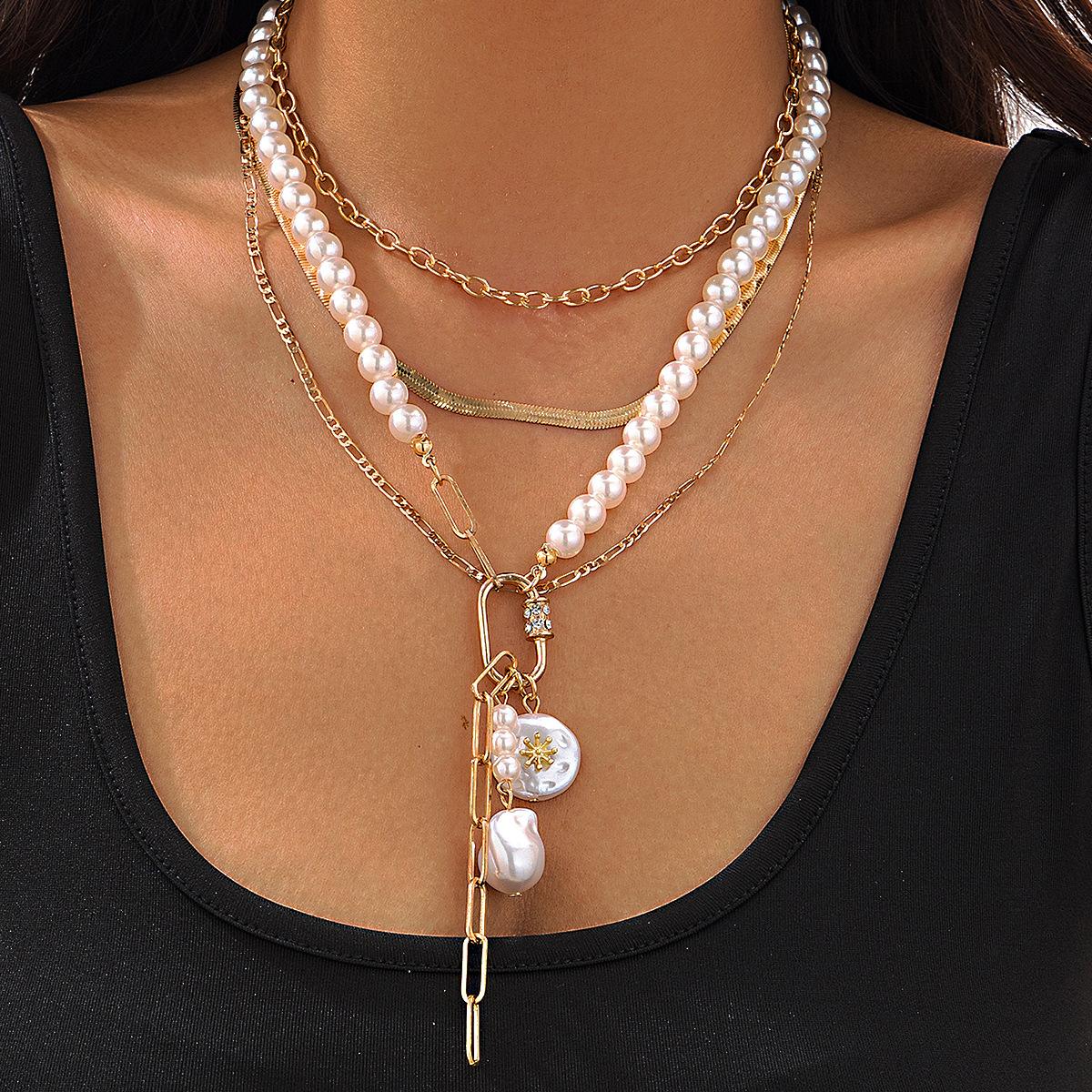 Fashion sense Multi-layer baroque imitation pearl necklace, snake bone chain stacked sweater chain jewelry
Fashion sense Multi-layer baroque imitation pearl necklace, snake bone chain stacked sweater chain jewelry