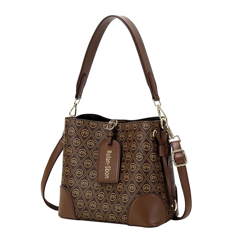 Универсальная нишевая сумка-ведро Новая простая наклонная сумка-седло женская сумка большой вместимости с принтом на одно плечо для женщин
Универсальная нишевая сумка-ведро Новая простая наклонная сумка-седло женская сумка большой вместимости с принтом на одно плечо для женщин