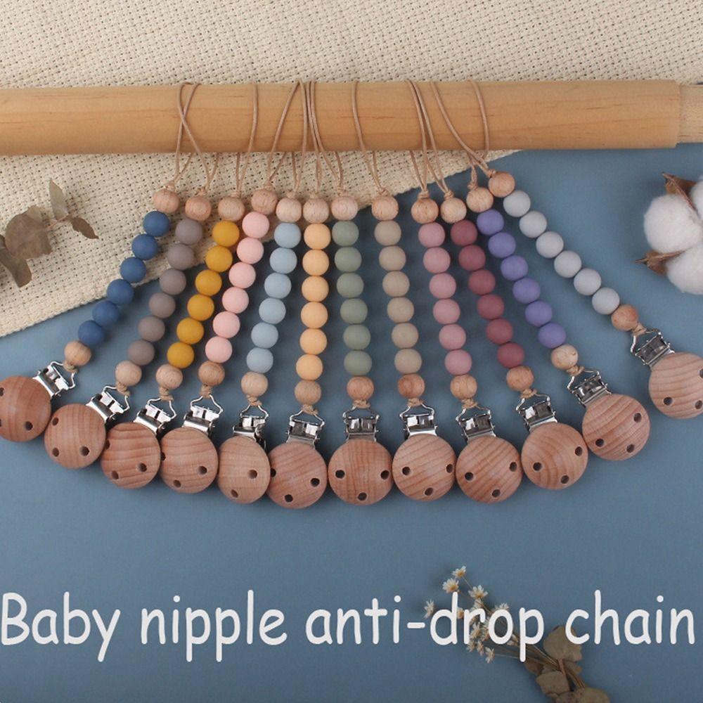 Grade Multi-color Anti-drop Wooden Pacifier Clips Chains Baby Pacifier Chain Silicone Nipple Holder
Grade Multi-color Anti-drop Wooden Pacifier Clips Chains Baby Pacifier Chain Silicone Nipple Holder
