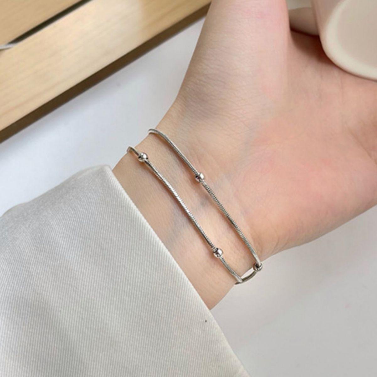 Double-Layer Stainless Steel Snake Chain Round Ball Bracelet - Minimalist Korean Style for Women
Double-Layer Stainless Steel Snake Chain Round Ball Bracelet - Minimalist Korean Style for Women