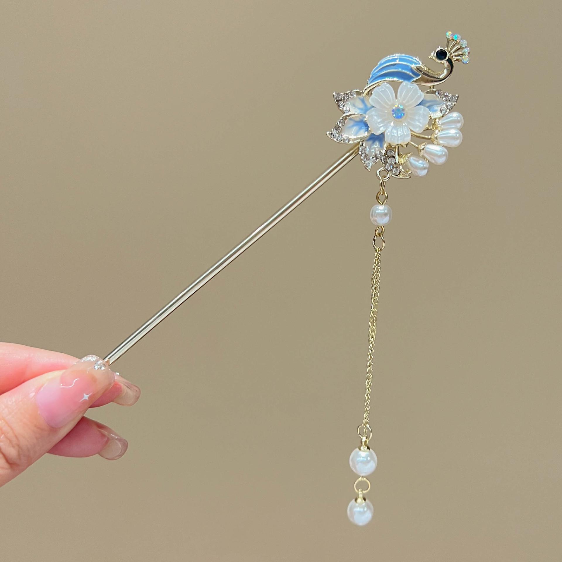 Головной убор с кисточкой для девочек-ханьфу - традиционный китайский аксессуар для волос
Головной убор с кисточкой для девочек-ханьфу - традиционный китайский аксессуар для волос