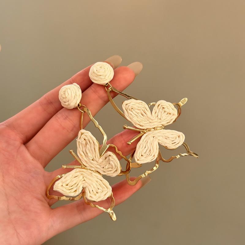 Silver needle raffia butterfly pendant earrings holiday style fresh and sweet temperament earrings niche high-end earrings women
Silver needle raffia butterfly pendant earrings holiday style fresh and sweet temperament earrings niche high-end earrings women