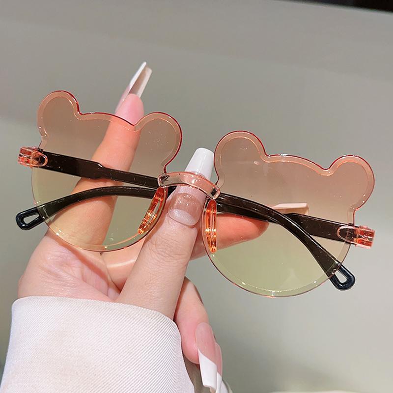 1/8 шт. Милые солнцезащитные очки в форме медведя для детей Новая мода Детские безободковые декоративные солнцезащитные очки с градиентными многоцветными линзами
1/8 шт. Милые солнцезащитные очки в форме медведя для детей Новая мода Детские безободковые декоративные солнцезащитные очки с градиентными многоцветными линзами