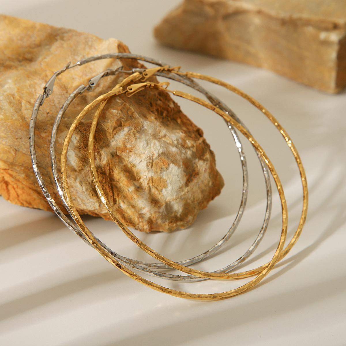 Exaggerated Hammered 18K Gold Stainless Steel Hoop Earrings - European & American High-End Fashion Style
Exaggerated Hammered 18K Gold Stainless Steel Hoop Earrings - European & American High-End Fashion Style
