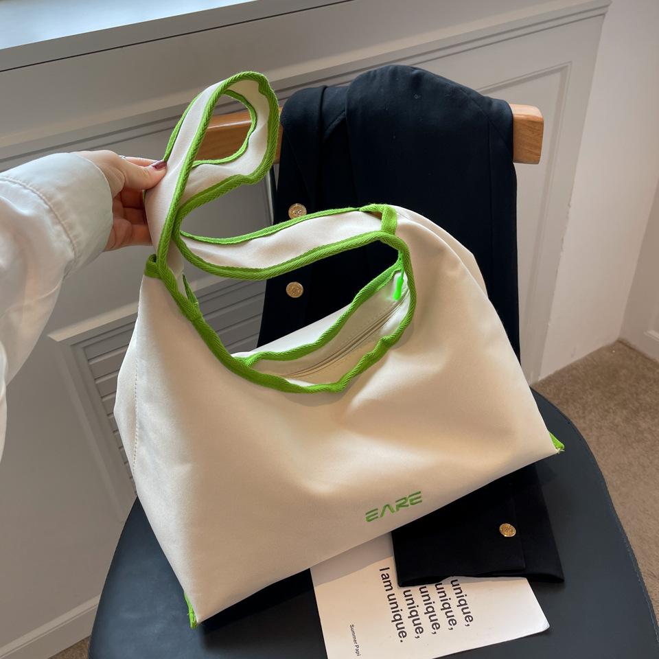 Daily commuting large-capacity women s bags New casual versatile contrasting color shoulder bags Stylish and simple canvas underarm bags синій
Daily commuting large-capacity women s bags New casual versatile contrasting color shoulder bags Stylish and simple canvas underarm bags синій