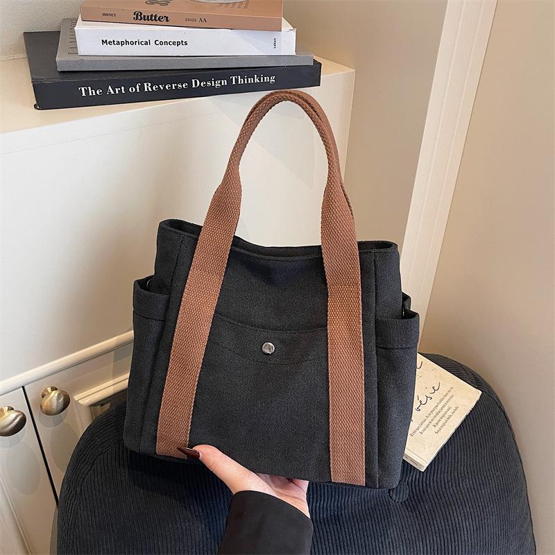 New Winter Vintage Canvas Top Handle Bag Women Fashi Multi Pocket Shoulder Bag Comfortable and Versatile Texture Storage Bag
New Winter Vintage Canvas Top Handle Bag Women Fashi Multi Pocket Shoulder Bag Comfortable and Versatile Texture Storage Bag