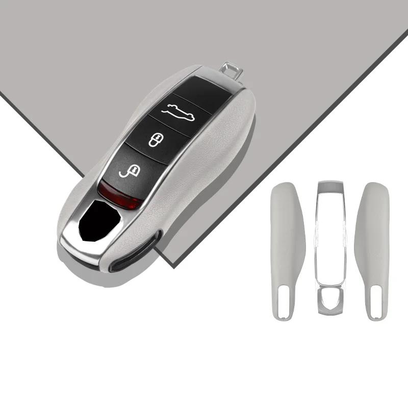 Розкішна Натуральна Шкіра для Porsche Boxster Cayman Panamera Cayenne Macan 718/911 Taycan Чохол для Ключа Автомобіля Захисний Брелок
Розкішна Натуральна Шкіра для Porsche Boxster Cayman Panamera Cayenne Macan 718/911 Taycan Чохол для Ключа Автомобіля Захисний Брелок