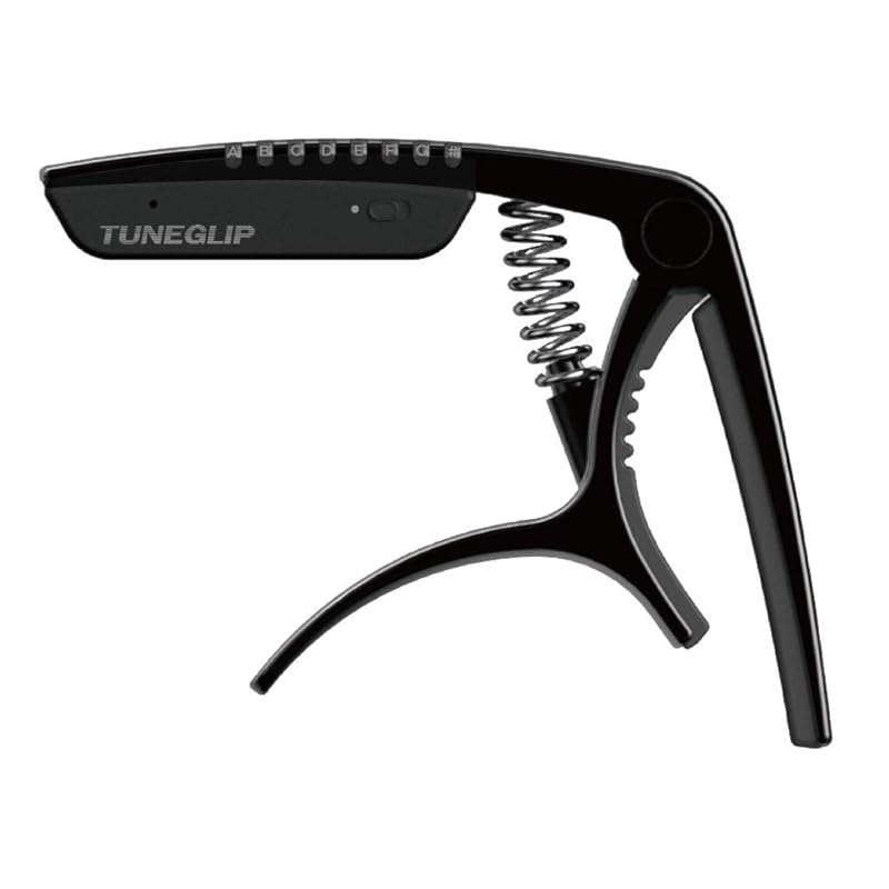 Revol effects Revol Effects Capo tasto with built-in chromatic tuner TUNEGLIP RCP-1/BK black (USB charging cable included)
Revol effects Revol Effects Capo tasto with built-in chromatic tuner TUNEGLIP RCP-1/BK black (USB charging cable included)