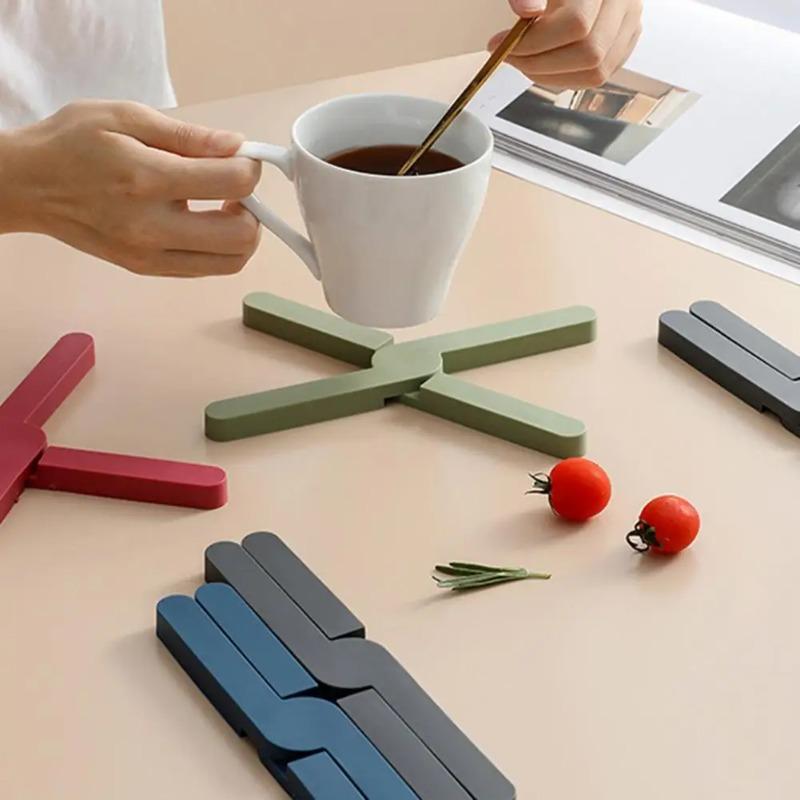 Creative Foldable Non-Slip Pan Mat Silicone Heat Resistant Pad Table Placemat Dish Plate Cross Holder Coaster Kitchen Table Mat 20X3.2X1.1cm
Creative Foldable Non-Slip Pan Mat Silicone Heat Resistant Pad Table Placemat Dish Plate Cross Holder Coaster Kitchen Table Mat 20X3.2X1.1cm