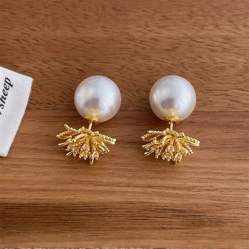 A pair of fireworks pearl stud earrings for women, silver needle temperament women s fashion earrings and earrings.
A pair of fireworks pearl stud earrings for women, silver needle temperament women s fashion earrings and earrings.