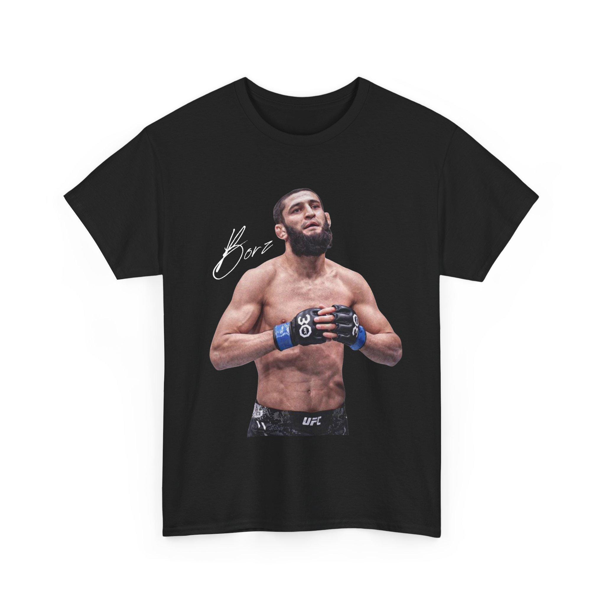 Летняя футболка UFC Хамзат Чимаев 2026 Fighting Graphic Tshirt Женская Спортивная Хлопковая С коротким рукавом Свободная Повседневная Футболка для Фитнеса Унисекс S
Летняя футболка UFC Хамзат Чимаев 2026 Fighting Graphic Tshirt Женская Спортивная Хлопковая С коротким рукавом Свободная Повседневная Футболка для Фитнеса Унисекс S