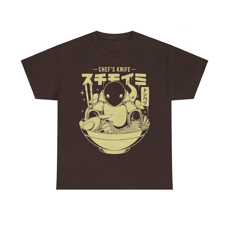 Tonberry Chefs Knife Ramen Japanese Food Tshirt Final Fantasy Video Games Final Fantasy VII Rebirth Gaming Tee 4XL
Tonberry Chefs Knife Ramen Japanese Food Tshirt Final Fantasy Video Games Final Fantasy VII Rebirth Gaming Tee 4XL