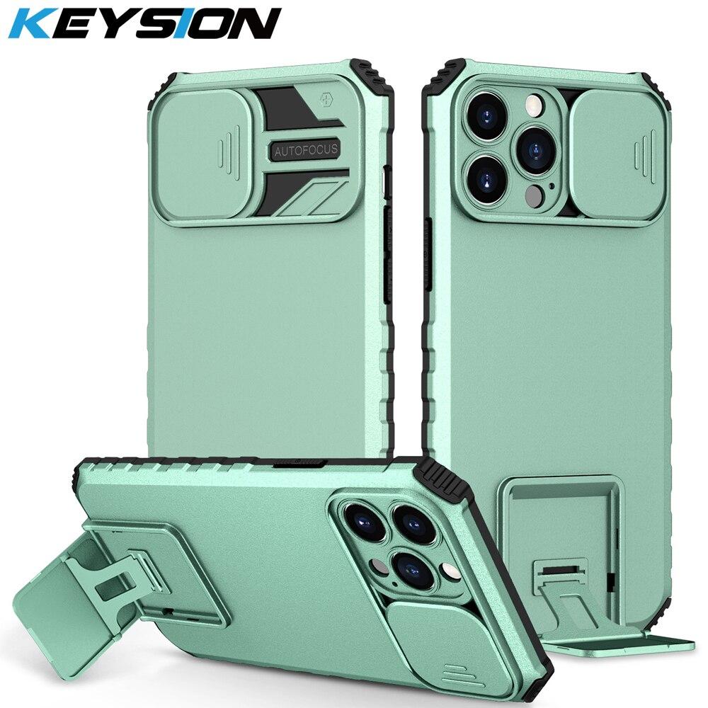 Противоударный чехол KEYSION для iPhone 13 12 Pro Max 11, защита камеры с подставкой, чехол для телефона с подставкой для iPhone XR XS 8 7 SE 2
Противоударный чехол KEYSION для iPhone 13 12 Pro Max 11, защита камеры с подставкой, чехол для телефона с подставкой для iPhone XR XS 8 7 SE 2