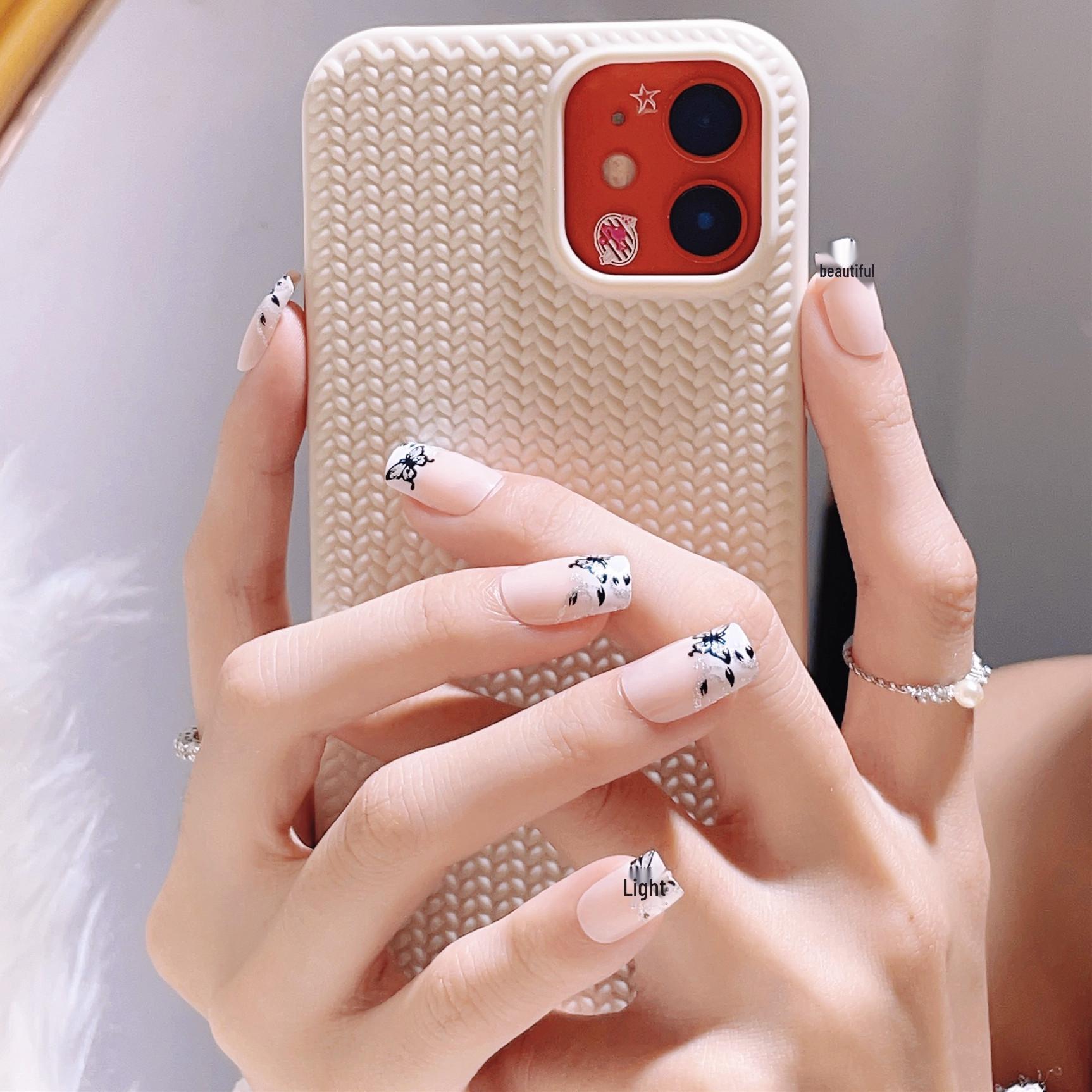 Elegant Silver Butterfly Press-On French Nails: Removable, Finished Nail Art
Elegant Silver Butterfly Press-On French Nails: Removable, Finished Nail Art