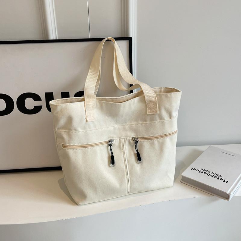Chic Minimalist Bucket Bag 2024 Spring Summer Collection Spacious Canvas Handbag OffWhite
Chic Minimalist Bucket Bag 2024 Spring Summer Collection Spacious Canvas Handbag OffWhite