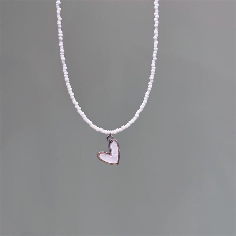 New Trend White Bead Necklace Heart-Shaped Pendant Choker For Women String Collar Charm Summer Bohemia Femme Zircon
New Trend White Bead Necklace Heart-Shaped Pendant Choker For Women String Collar Charm Summer Bohemia Femme Zircon
