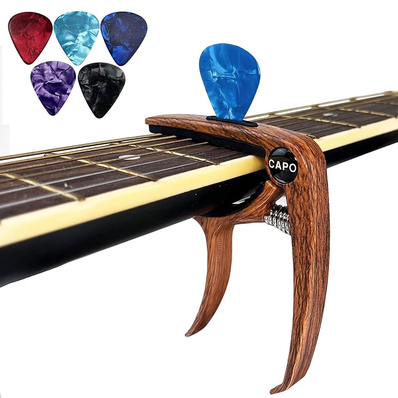 capo tasto - Comes with 5 guitar plectrums, perfect for capo, capo tasto, guitar, ukulele, and acoustic guitar. (A2)
capo tasto - Comes with 5 guitar plectrums, perfect for capo, capo tasto, guitar, ukulele, and acoustic guitar. (A2)