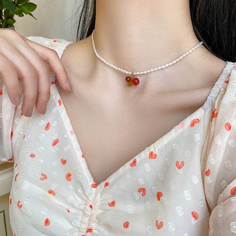 Elegant Freshwater Pearl Necklace with Cherry Pendant - Simple, Trendy Choker Design for Women
Elegant Freshwater Pearl Necklace with Cherry Pendant - Simple, Trendy Choker Design for Women