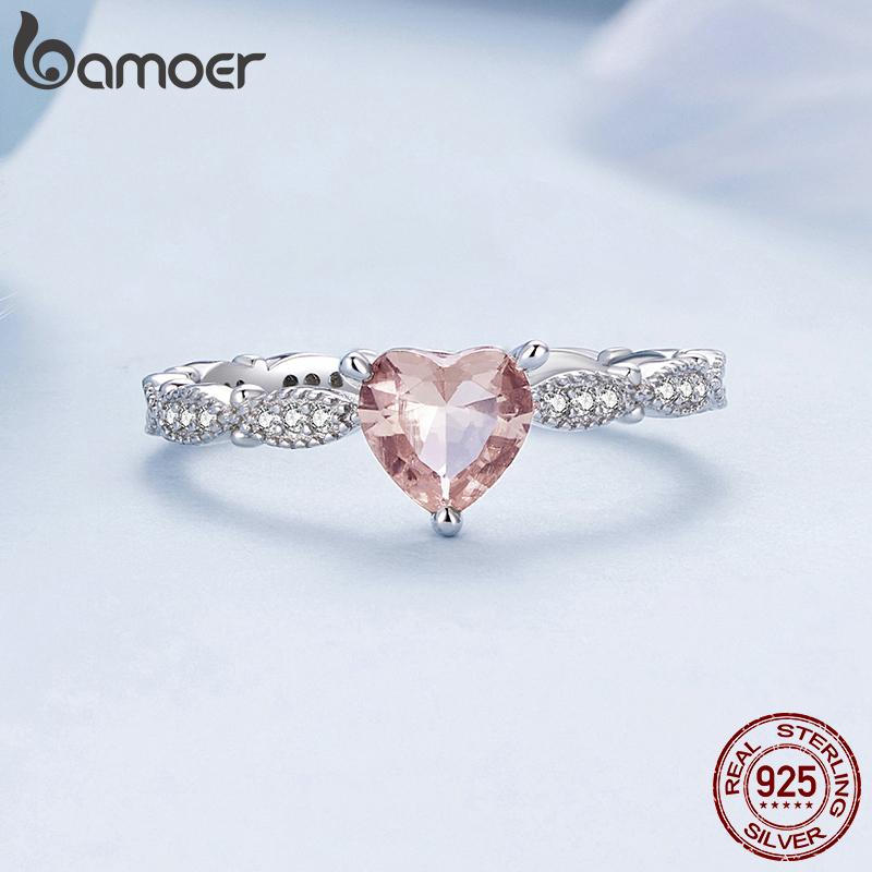BAMOER 925 925 Sterling Silver Colour Changel Heart Stone Finger Ring Модний Stackable Band для жінок Заручини Вишукані ювелірні вироби Подарунок A-6
BAMOER 925 925 Sterling Silver Colour Changel Heart Stone Finger Ring Модний Stackable Band для жінок Заручини Вишукані ювелірні вироби Подарунок A-6