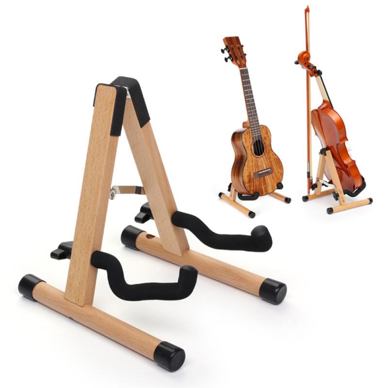 Ukulele Стенд A-Frame Держатель с бантом Отверстие скрипки Дисплей Стойка с мягким пенопластовым протекторным основанием для
Ukulele Стенд A-Frame Держатель с бантом Отверстие скрипки Дисплей Стойка с мягким пенопластовым протекторным основанием для