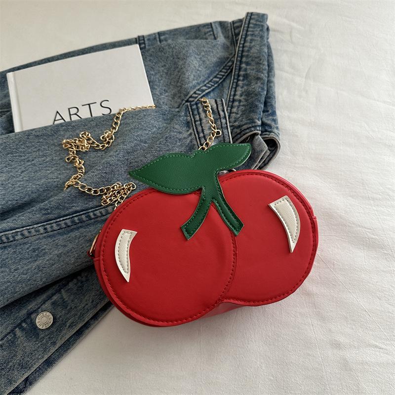 Летняя новая модная креативная сумка-мессенджер через плечо в форме вишни, женская милая, с индивидуальностью, маленькая цепочка, повседневная сумка красный
Летняя новая модная креативная сумка-мессенджер через плечо в форме вишни, женская милая, с индивидуальностью, маленькая цепочка, повседневная сумка красный