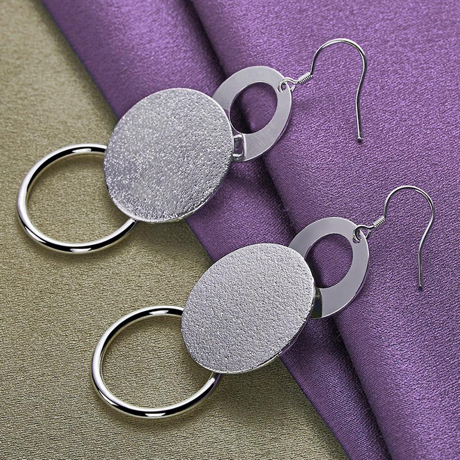 CHSHINE стерлингового серебра 925 пробы матовые круглые брендовые серьги для женщин Свадебная вечеринка модные очаровательные ювелирные изделия 2.50*7.30cm
CHSHINE стерлингового серебра 925 пробы матовые круглые брендовые серьги для женщин Свадебная вечеринка модные очаровательные ювелирные изделия 2.50*7.30cm