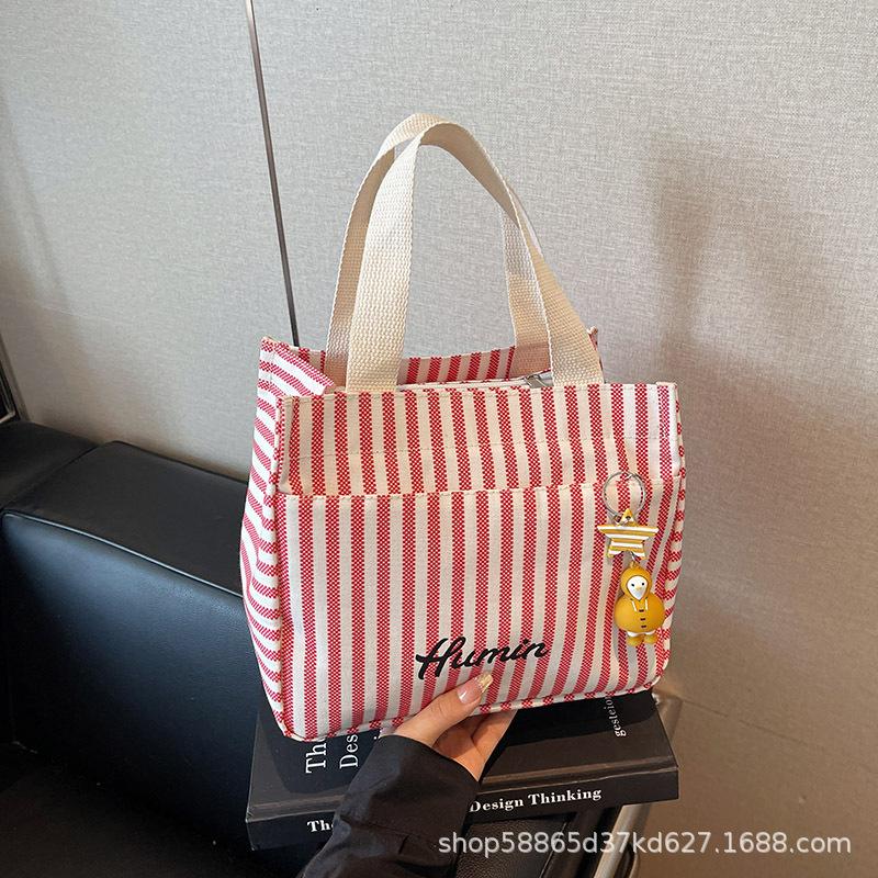 Large capacity canvas bag women s 2026 new versatile striped shoulder bag student commuting tote bag for commuting to class No accessories
Large capacity canvas bag women s 2026 new versatile striped shoulder bag student commuting tote bag for commuting to class No accessories