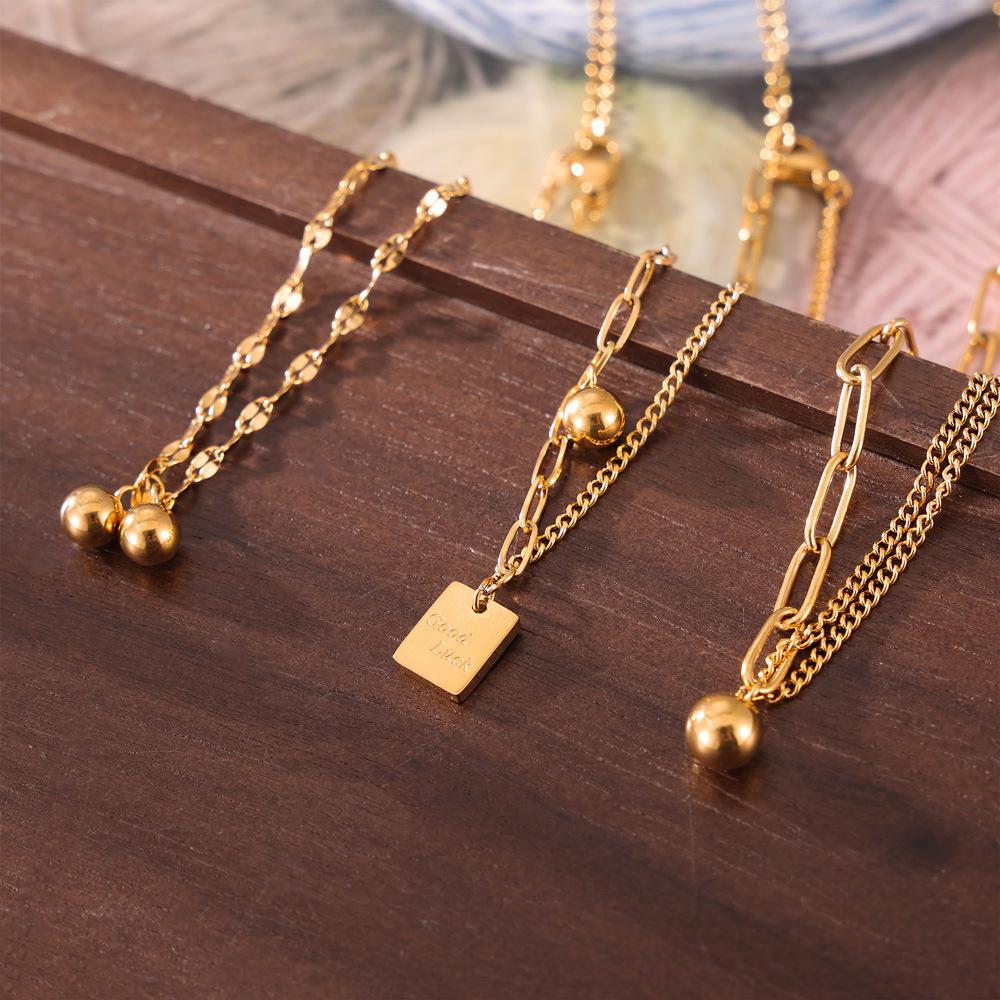 New English Letter Luck Anklet: Steel Ball Titanium Square Plate for Women - Simple, Versatile Splicing Design
New English Letter Luck Anklet: Steel Ball Titanium Square Plate for Women - Simple, Versatile Splicing Design