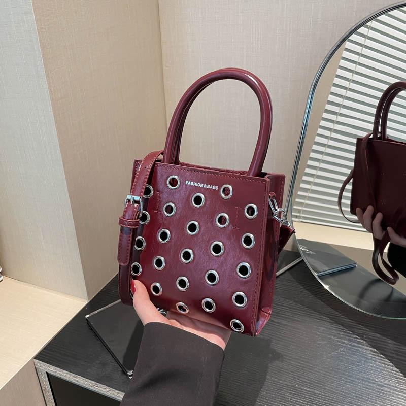Fashion Tote Bag Women Punk Style Rivet Chain Underarm Bag Brand Design Hollow Shoulder Bag Shopping Party Street Handbag
Fashion Tote Bag Women Punk Style Rivet Chain Underarm Bag Brand Design Hollow Shoulder Bag Shopping Party Street Handbag