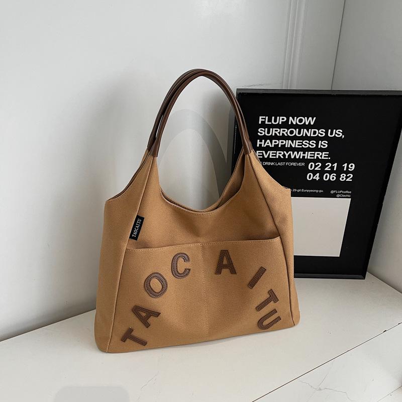 New Simple Retro Shoulder Bag Women s Fashion Letter Large Capacity Handbag Casual Backpack
New Simple Retro Shoulder Bag Women s Fashion Letter Large Capacity Handbag Casual Backpack