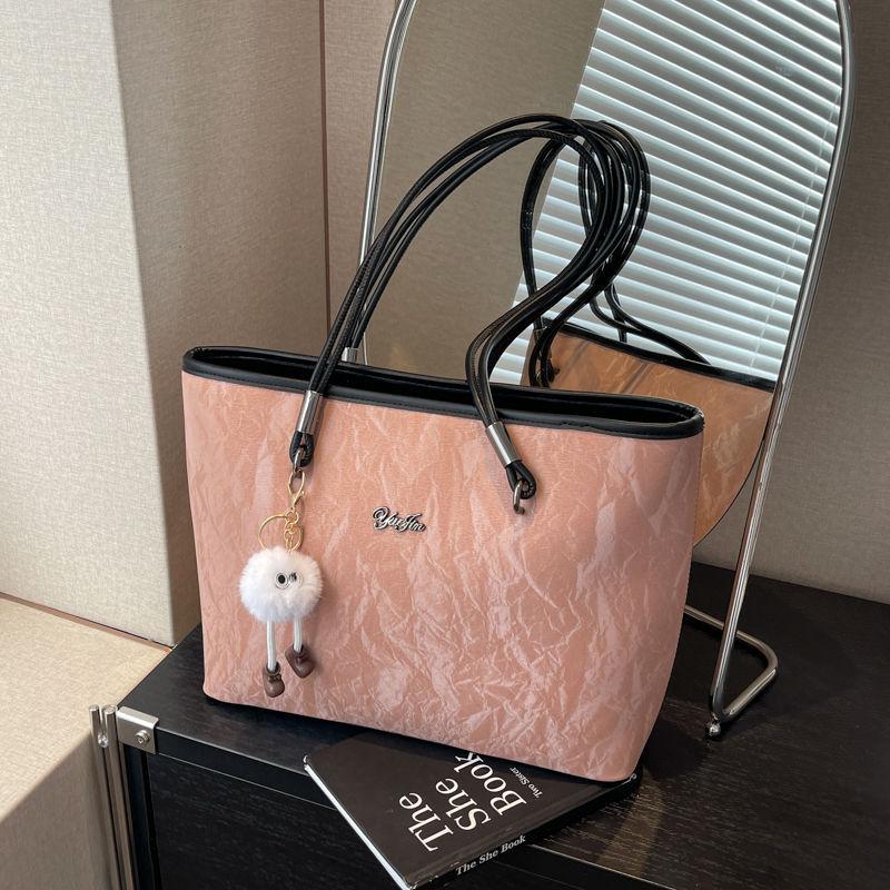 The bag women s 2025 new model is popular this year, the large-capacity tote bag is casual and versatile, and the college student class bag is a commu + with pendant рожевий
The bag women s 2025 new model is popular this year, the large-capacity tote bag is casual and versatile, and the college student class bag is a commu + with pendant рожевий