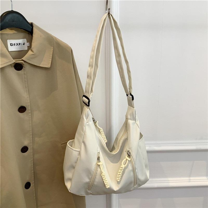 Trendy Casual Large Capacity Versatile Soft Cloth Simple Handbag Travel Bag Student s New Style Women s Shoulder Crossbody Bag білий
Trendy Casual Large Capacity Versatile Soft Cloth Simple Handbag Travel Bag Student s New Style Women s Shoulder Crossbody Bag білий