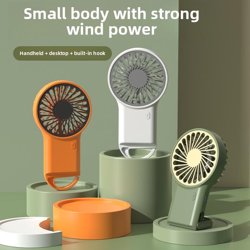 2025 New handheld foldable desktop USB charging mini fan, cartoon climbing hook mini silent fan Other темно-зелений колір
2025 New handheld foldable desktop USB charging mini fan, cartoon climbing hook mini silent fan Other темно-зелений колір