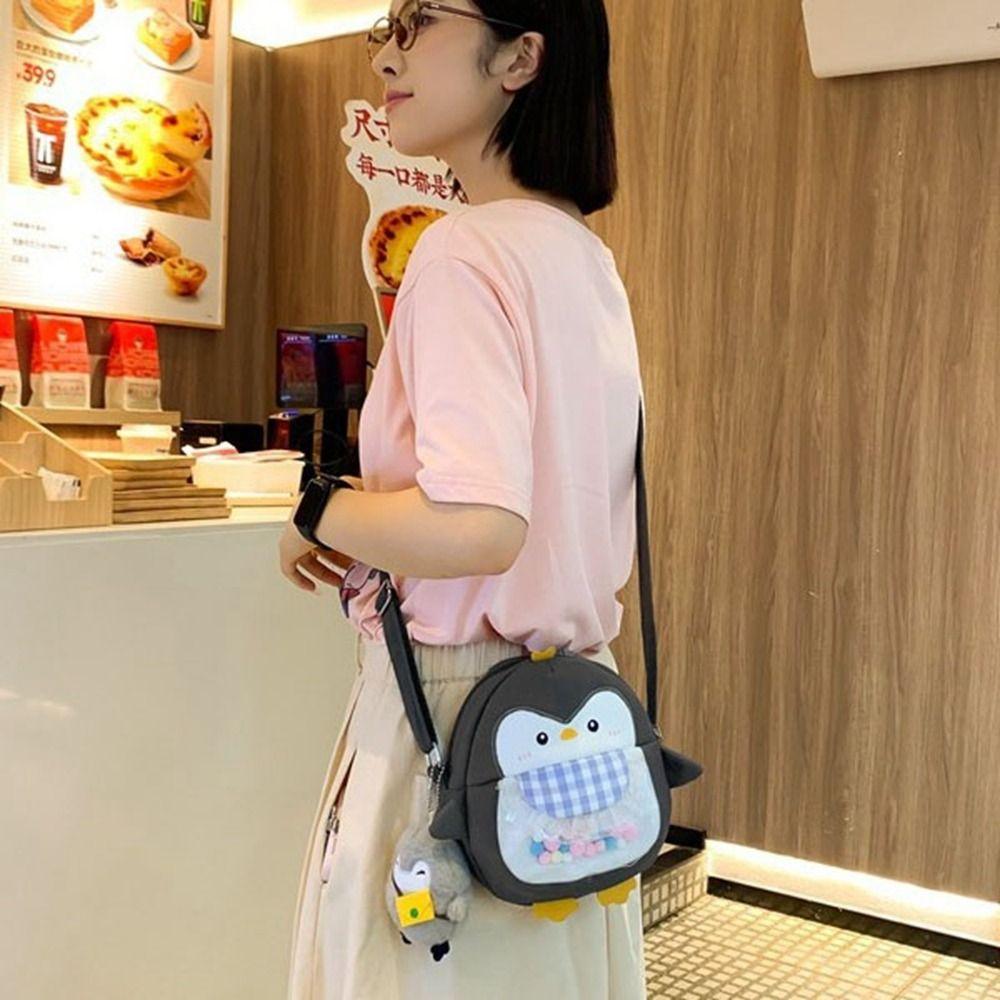 Большая вместимость нейлоновая сумка через плечо холст мультяшная сумка мода пингвин кулон шопинг светло-серый
Большая вместимость нейлоновая сумка через плечо холст мультяшная сумка мода пингвин кулон шопинг светло-серый