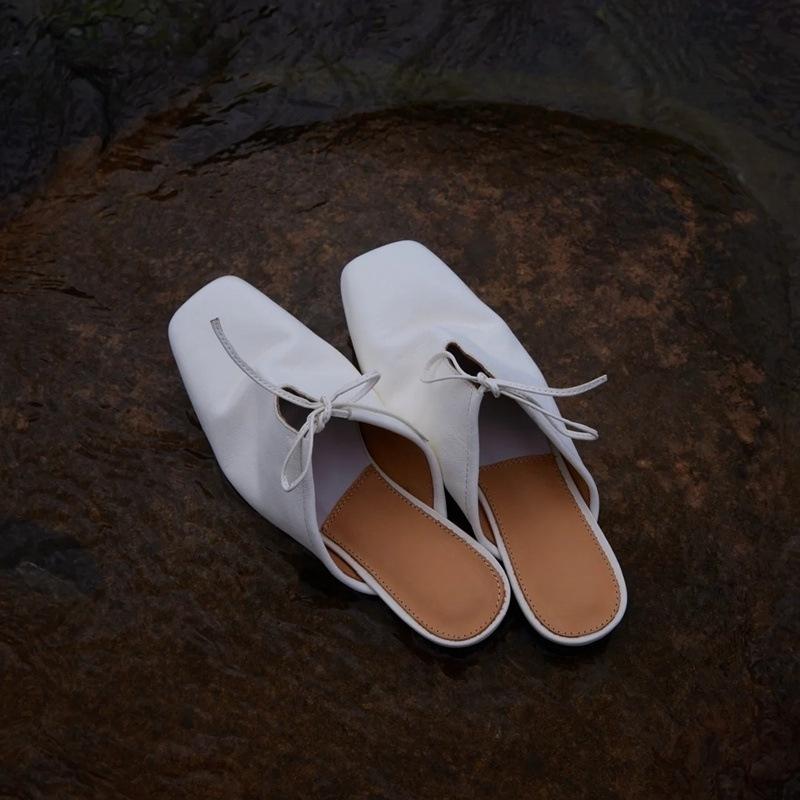 Retro lace-up bow baotou half slippers women s hollowed-out versatile square head flats outer wear 35 чорний
Retro lace-up bow baotou half slippers women s hollowed-out versatile square head flats outer wear 35 чорний