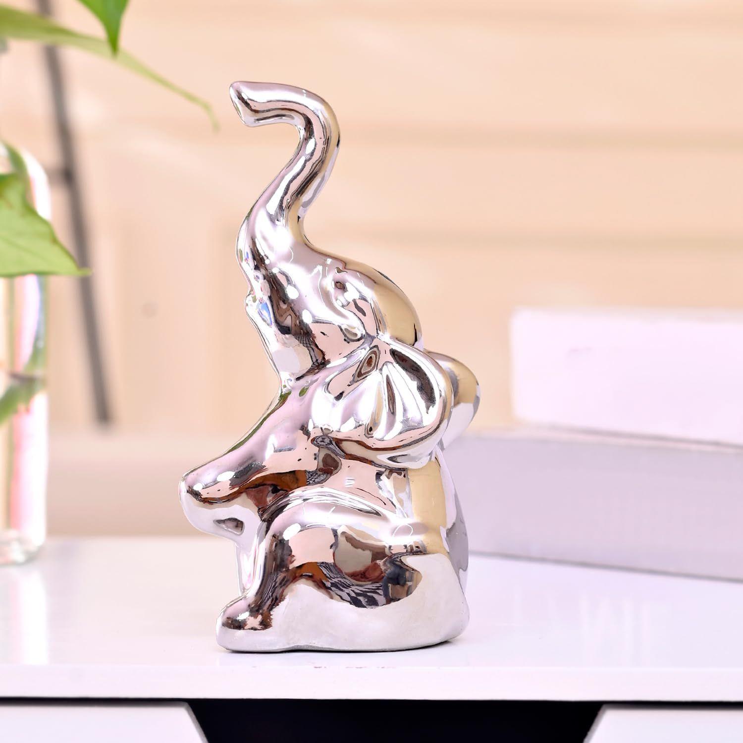 Изящная фигурка слона с высоким туловищем | Символ удачи и процветания | Идеально подходит для элегантного домашнего декора – Упаковка из 1 шт., Серебристый
Изящная фигурка слона с высоким туловищем | Символ удачи и процветания | Идеально подходит для элегантного домашнего декора – Упаковка из 1 шт., Серебристый