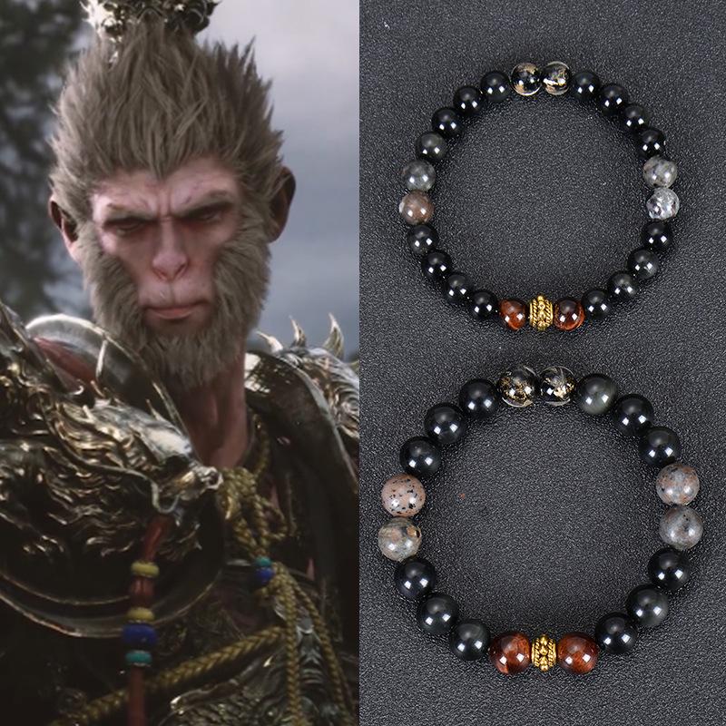 Obsidian Flame & Red Tiger Eye Beaded Bracelet: Mythical Wukong Hand Jewelry with Gold Foil Accents
Obsidian Flame & Red Tiger Eye Beaded Bracelet: Mythical Wukong Hand Jewelry with Gold Foil Accents