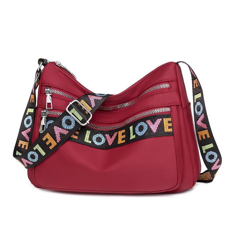 Oxford Fabric Shoulder Crossbody Bag Women Large Capacity Multiple Pockets Letter Print Korean Style Fashi Trendy червоний
Oxford Fabric Shoulder Crossbody Bag Women Large Capacity Multiple Pockets Letter Print Korean Style Fashi Trendy червоний