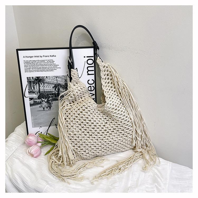 Tassel bag women s hollow handwoven bag beach bag new women s shoulder versatile tote bag
Tassel bag women s hollow handwoven bag beach bag new women s shoulder versatile tote bag